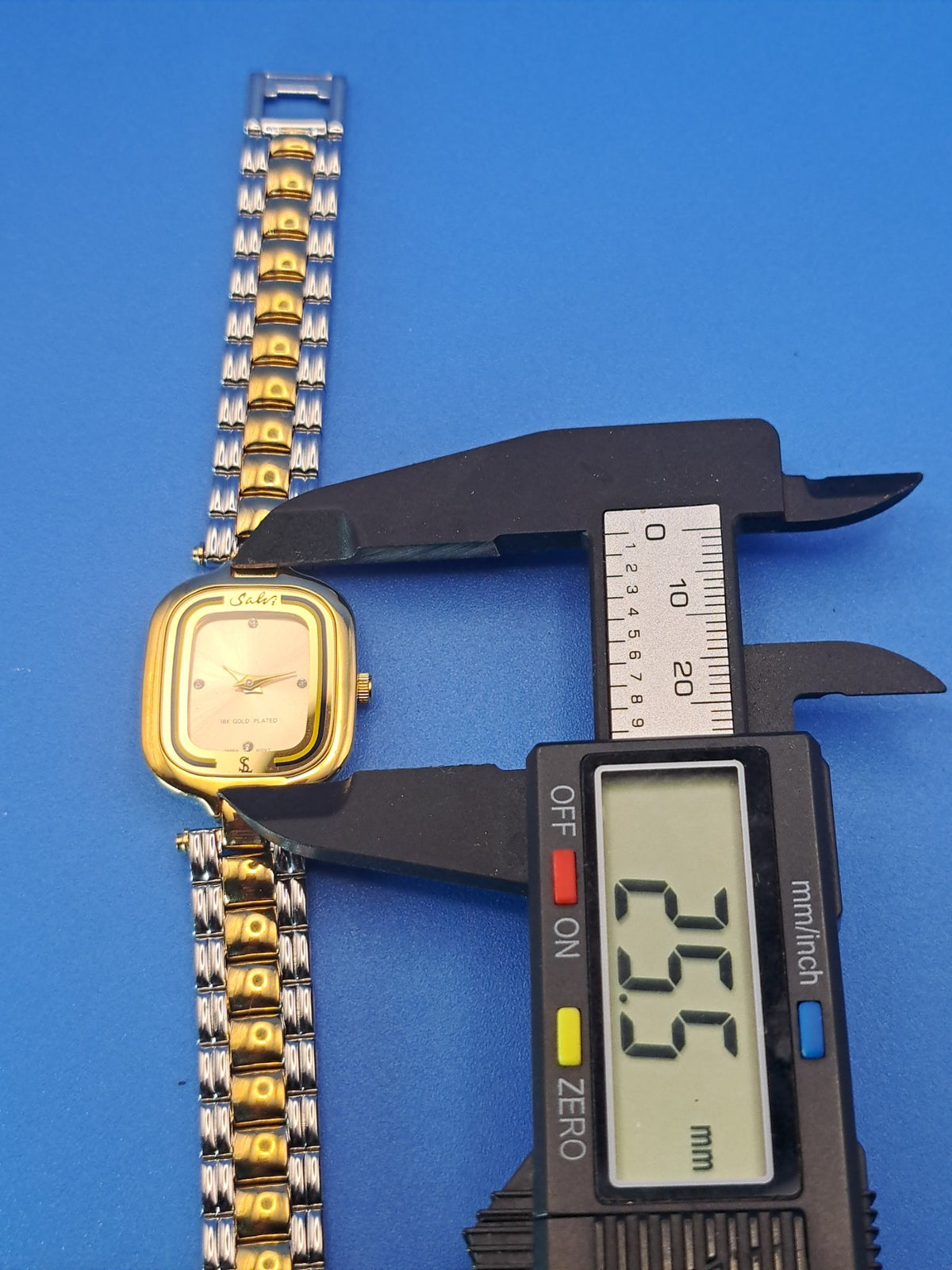 Salvi watch with caliper showing 25.5mm case