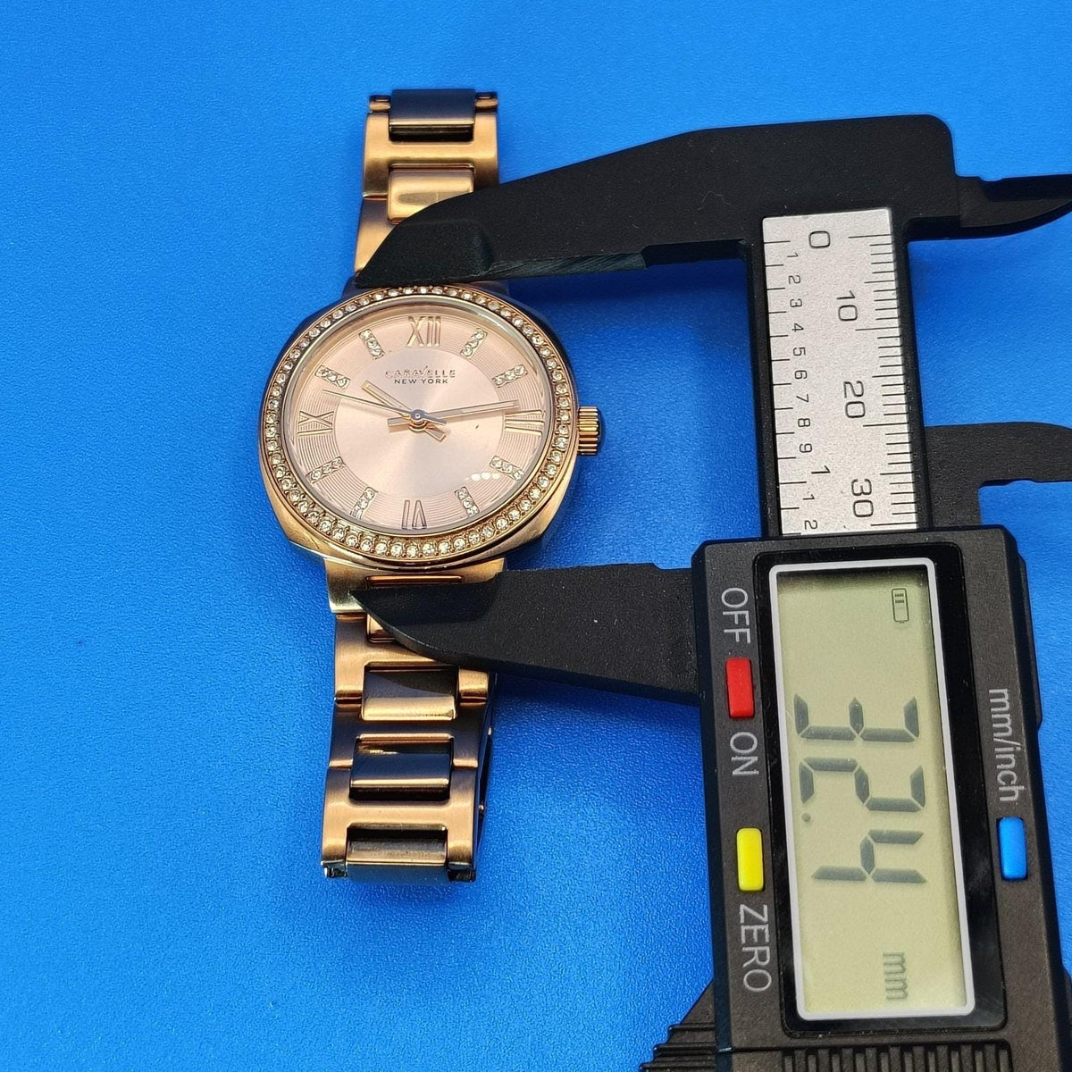 Vintage 2009 Caravelle by Bulova Rhinestone Bezel 32mm Gold Women's Quartz Watch